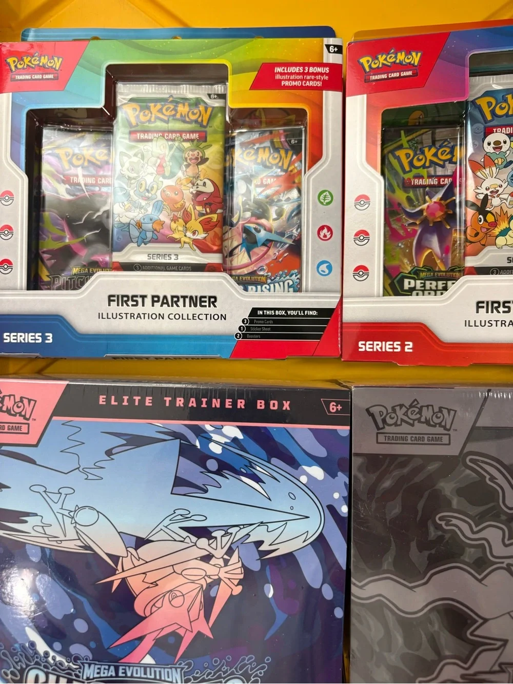 Pokemon Booster & Elite Trainer Box Assortment with Yellow Packaging
